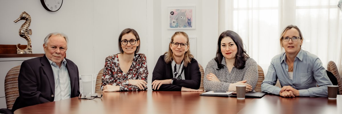 Team sitting at a table